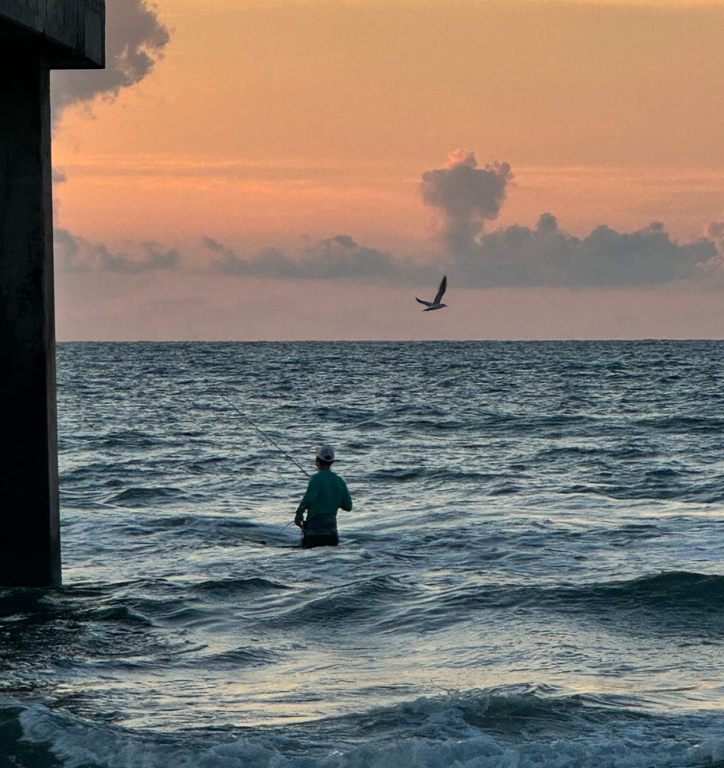 Sunset over the water while fishing in Corpus Christi